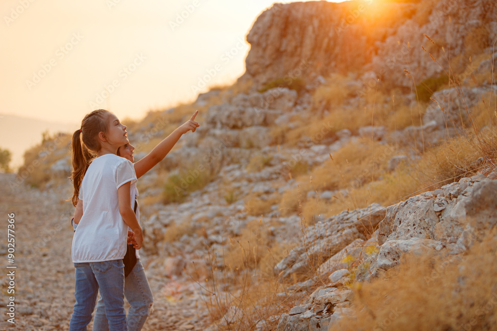 Fototapeta premium Happy Tourists Walking in the Mountains