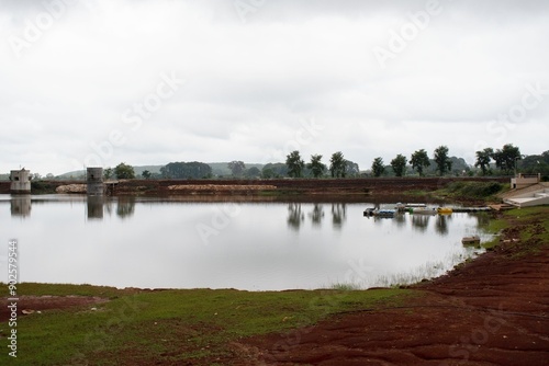 serene tranquil beauty of netarhat lake in a gloomy day, jharkhand, india photo