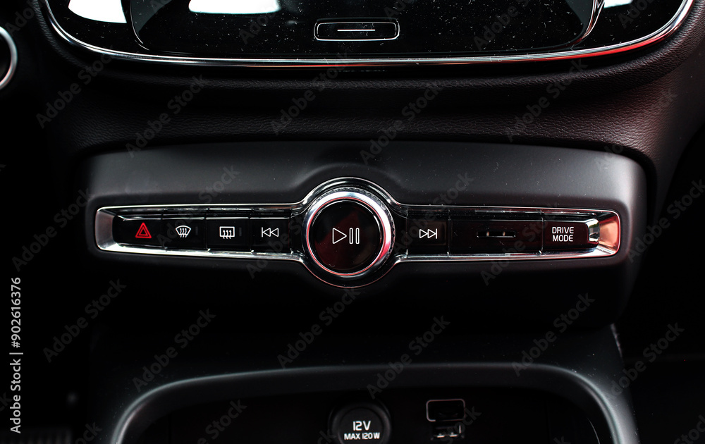 Modern car interior. Dashboard, multimedia, radio, control buttons. Modern car interior. Dashboard, multimedia, radio, control buttons.