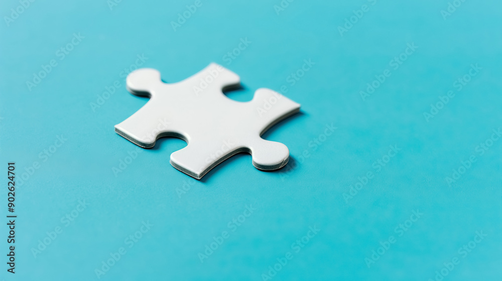 Obraz premium A jigsaw puzzle piece on blue background, symbolizing an organized approach to marketing