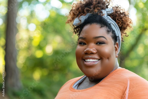 Beautiful Smiling Happy Plus-Sized Woman of Color Exercising. Large Black Woman Wearing Exercise Fitness