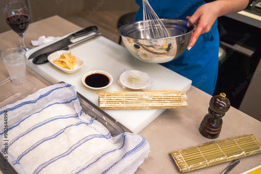 Chef in Action: Preparing a Meal in the Sushi Workshop Chef in Action: Preparing a Meal in the Sushi Workshop