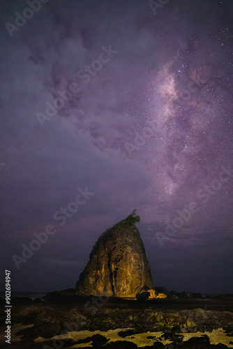 Milkyway above Watu Lumbung rock in Gunung Kidul Jogjakarta photo