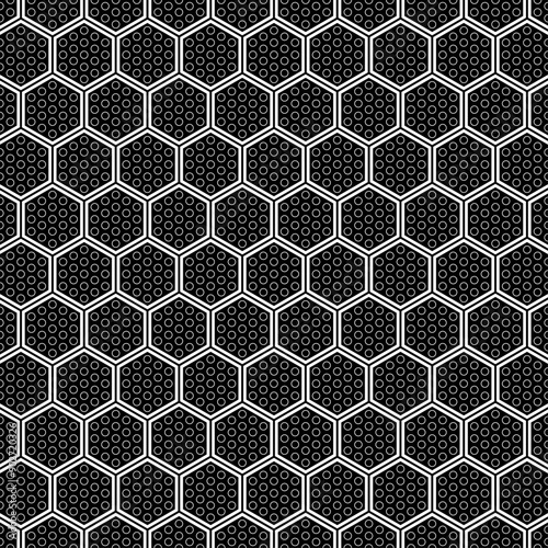 Black and white hexagonic geometric pattern with small circle details inside each hexagon, creating an interesting and modern visual effect.