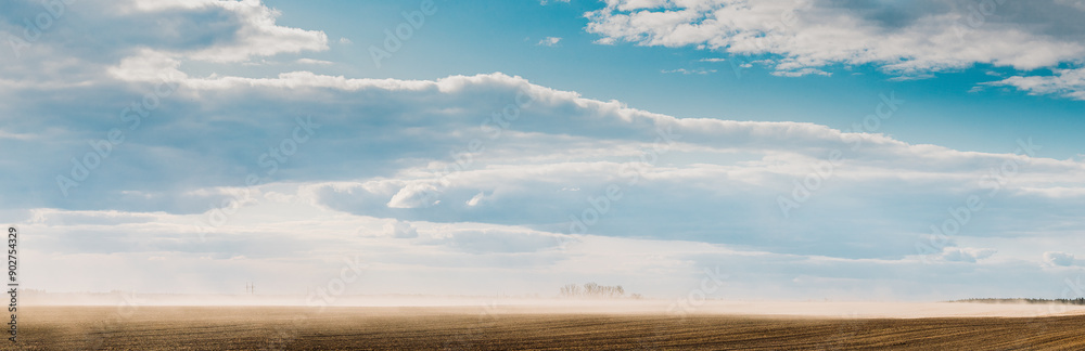 Belarus, Europe. Spring Dust Storm. A Dust Cloud From Agricultural Field Envelops Landscape