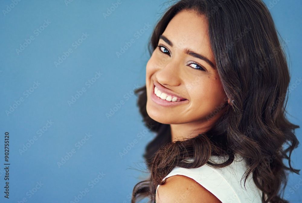 Woman, smile and receptionist portrait in studio, happy and mock up with administration employee. Corporate business, secretary and blue background with confidence, administrator and professional