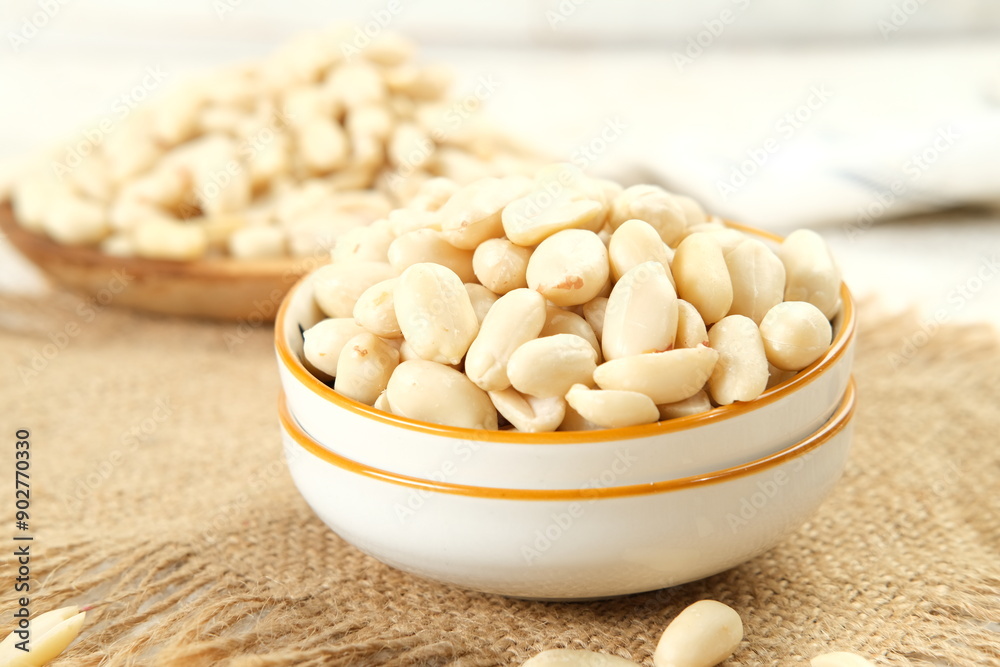 peelled peanuts in a small bowl. High-resolution, detailed texture, and natural colors. Perfect for food blogs, peelled peanuts in a small bowl. High-resolution, detailed texture, and natural colors. Perfect for food blogs,