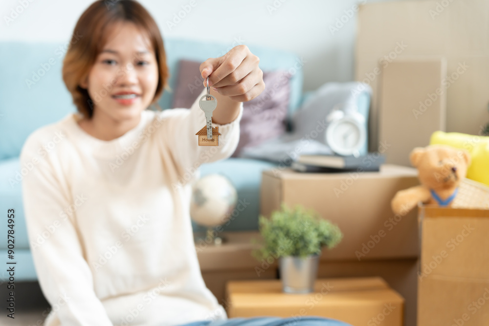 Moving house, relocation. Woman hold key house keychain in new apartment. move in new home. Buy or rent real estate. flat tenancy, leasehold property, new landlord, dwelling, loan, mortgage.. Moving house, relocation. Woman hold key house keychain in new apartment. move in new home. Buy or rent real estate. flat tenancy, leasehold property, new landlord, dwelling, loan, mortgage..