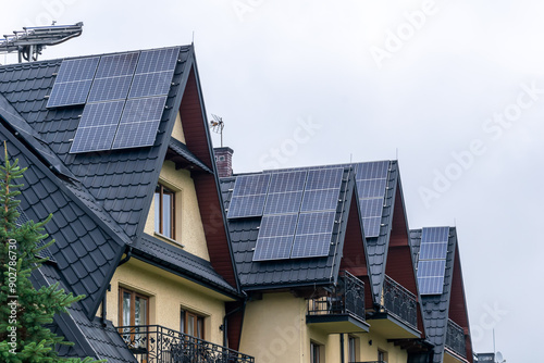 photovoltaic panels on a black metal roof tile