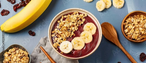 Deliciously prepared acai bowl topped with granola and banana slices, showcasing vibrant colors and healthy ingredients