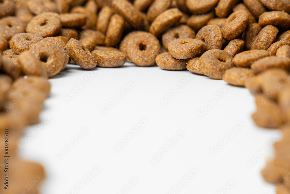 Fototapeta premium Pet food pellet background with space for text