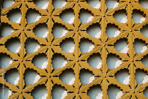 Closeup wooden Korean Traditional Architecture. Detail of Korean Palace window. Beautiful korean style background with copy space. Yellow vintage color.