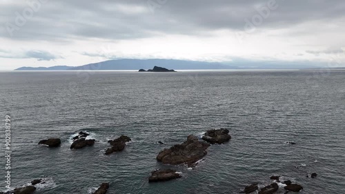日本の風景 青い海と岬の上にある展望台をドローンで空撮 鹿児島県志布志市の風景