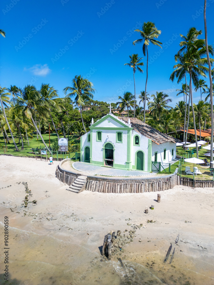 Obraz premium Aerial photo of São Benedito Church at Praia dos Carneiros in the city of Tamandaré, state of Pernambuco, Brazil
