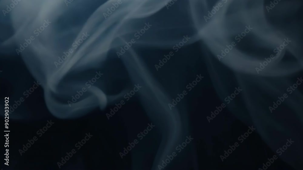 Gray smoke swirls at black background. Abstract dark atmospheric footage effect for halloween clip or tabaco advertising.