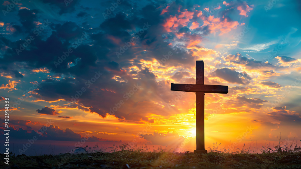 Wooden cross stands on a hilltop as the sun rises in a breathtaking sky Wooden cross stands on a hilltop as the sun rises in a breathtaking sky
