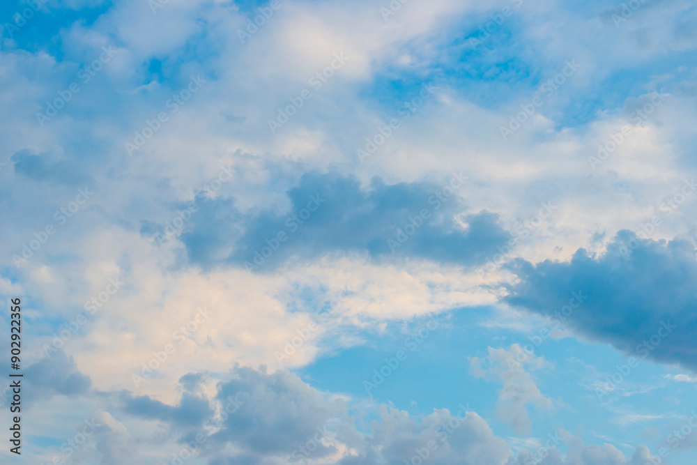 Fototapeta premium Dark and white clouds in a blue sky sky, Almere, Flevoland, The Netherlands, July 30, 2024