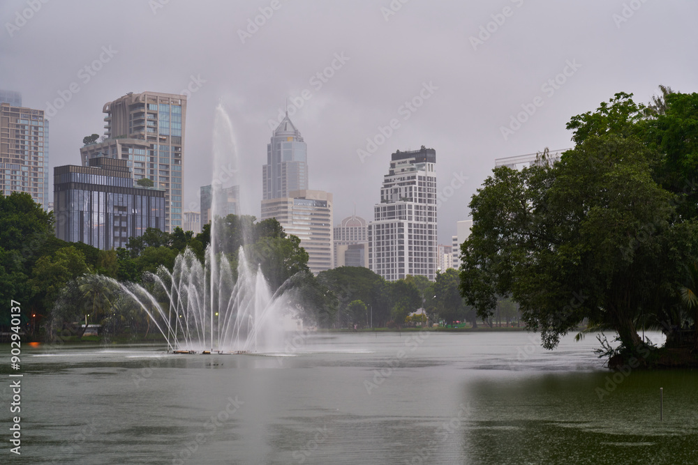 Fototapeta premium Lumphini Park on a rainy day in Bangkok, Thailand