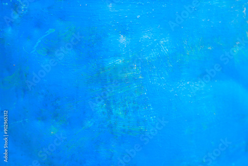 A blue background with a few brush strokes