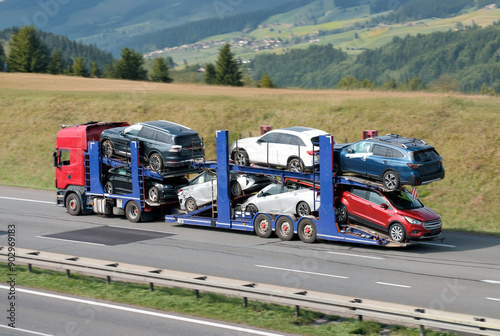Car Carrier Truck With Second-Handed Damaged Vehicles photo