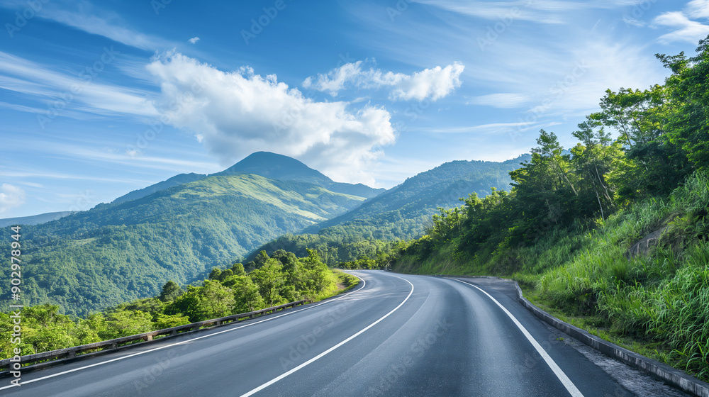 Picturesque view of mountain road along mountain ridges and trees. Background with beautiful road and mountain view Picturesque view of mountain road along mountain ridges and trees. Background with beautiful road and mountain view