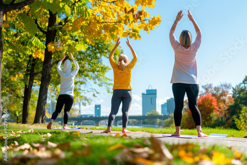 Group doing yoga poses photo