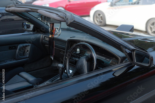 27.07.2024 Novosibirsk, Meet, Targa Car interior Toyota Supra a70 1990 in Black, pop-up headlights