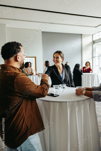 Networking and refreshments: Corporate professionals mingling at an event