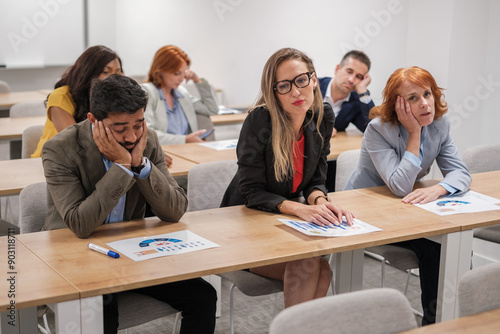 Group of students from a business training master's degree bored and tired of so many presentations