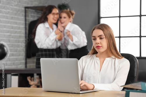 Young woman working in offi...