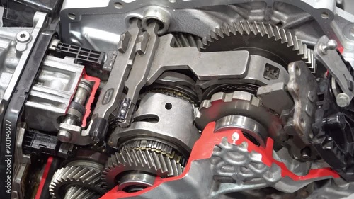 Direct-shift gearbox DSG transmission cutaway  in section as an educational sample .