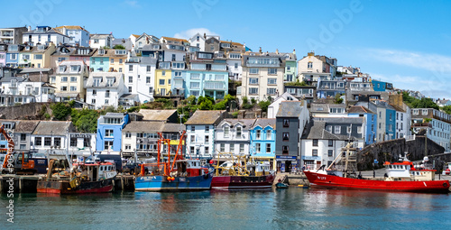 Colourful houses overlooking the harbour in the seaside town of Brixham on the Devon coast photo