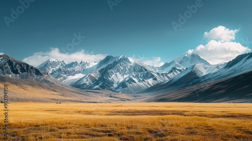 serene landscape with snow-capped peaks and a clear blue sky, majestic and tranquil