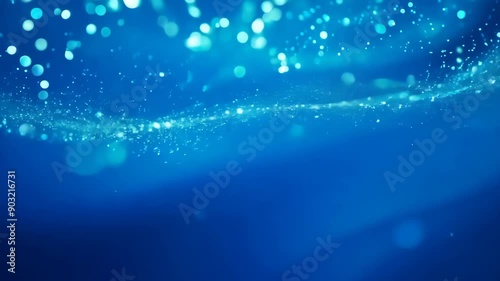 Blue underwater scene with sparkling light