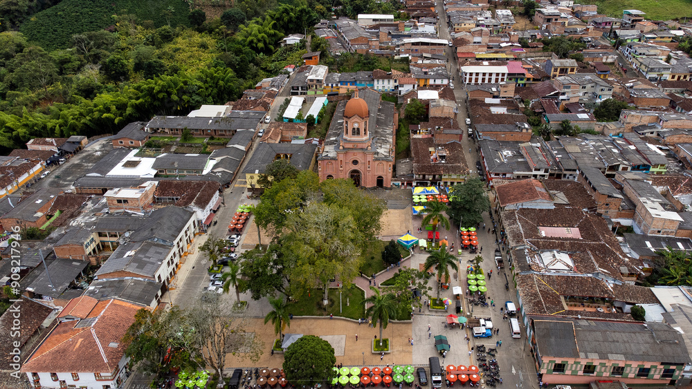 Naklejka premium Pueblorrico, Antioquia - Colombia - July 21, 2024. Aerial photograph with drone of the municipality, 120.6 km away from the city of Medellin.