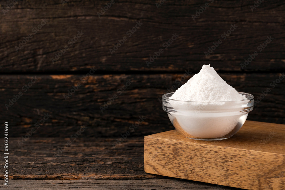 Baking soda - Crystalline solid compound in the bowl.
