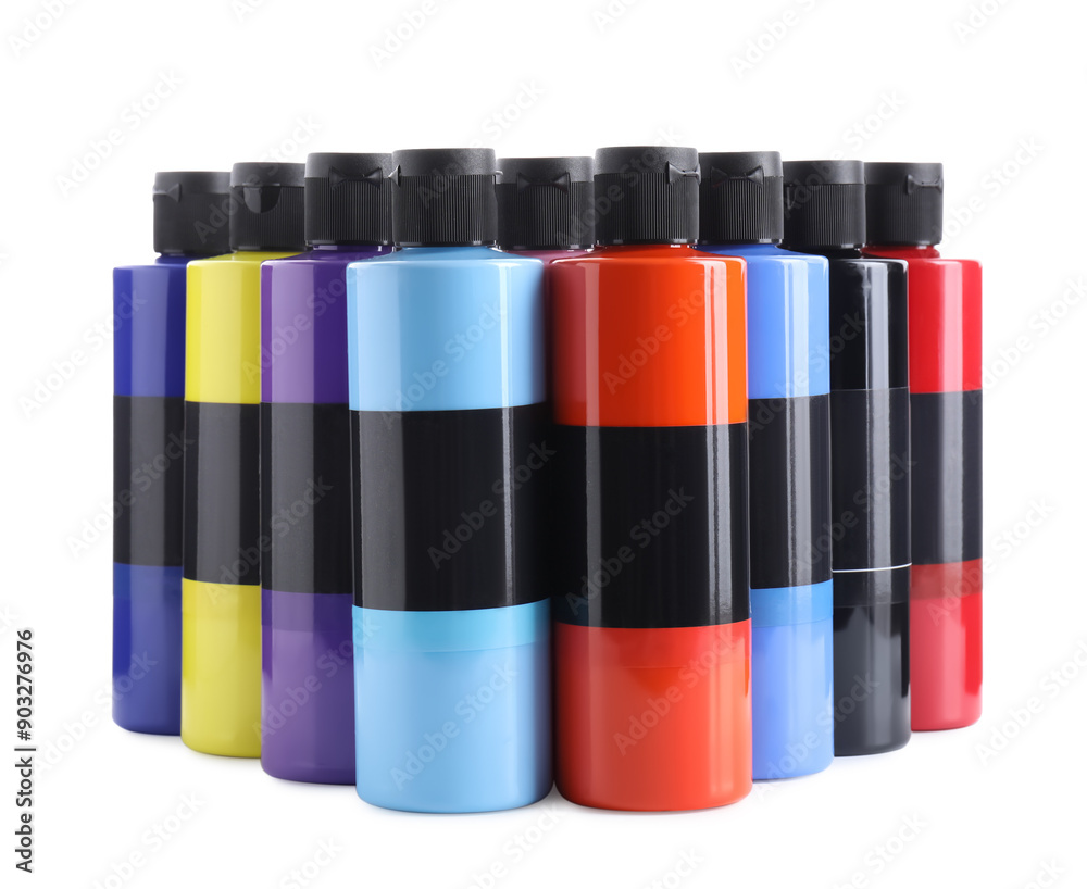 Acrylic paints of different colors in bottles isolated on white Acrylic paints of different colors in bottles isolated on white