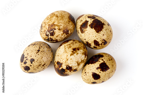 Quail eggs, close-up, isolated on white background.