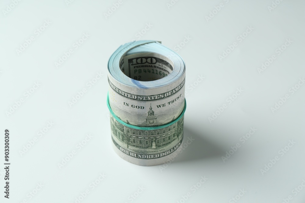 Roll of dollar banknotes on white background Roll of dollar banknotes on white background