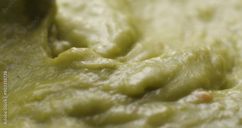 Guacamole preparing close up slowmotion Guacamole preparing close up slowmotion