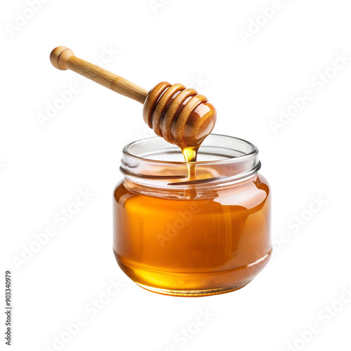 honey in a jar and spoon