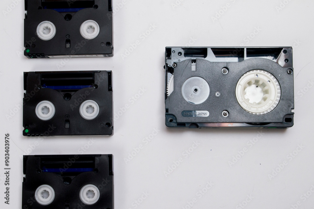 Fototapeta premium Minidv video tape vs vhs c video tape