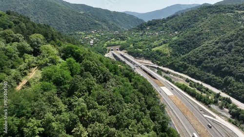 Aerial view of new road through Rikoti pass. Drone shot above highway in mountains of Georgia 2024 summer photo