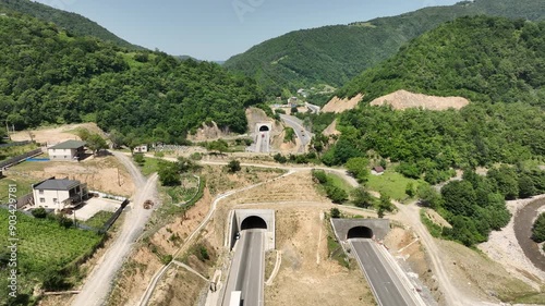 Aerial view of new road through Rikoti pass. Drone shot above highway in mountains of Georgia 2024 summer photo