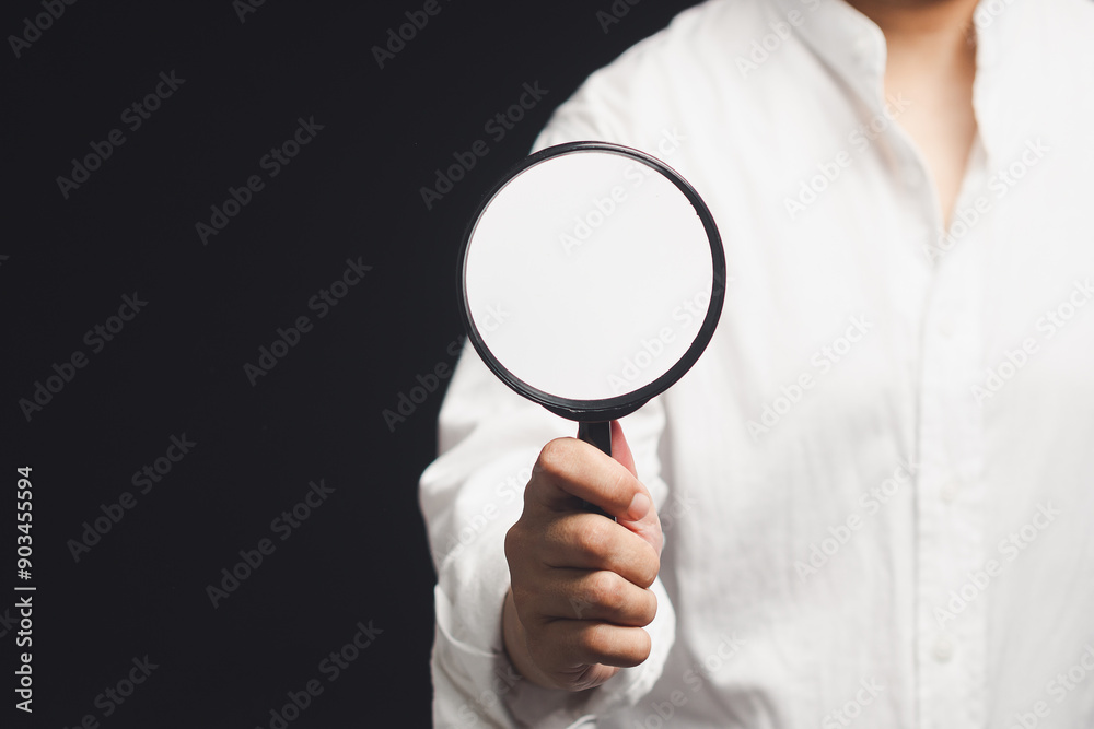 Magnifying glass for detailed inspection in hand. business analysis concept. Magnifying glass for detailed inspection in hand. business analysis concept.