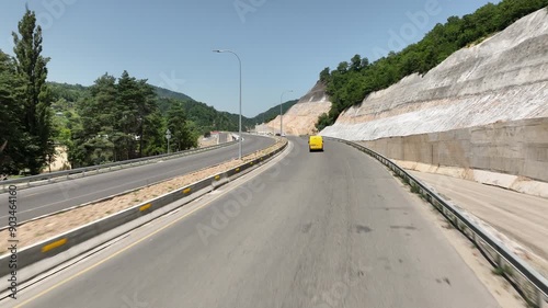 Aerial view of new road through Rikoti pass. Drone shot above highway in mountains of Georgia 2024 summer photo