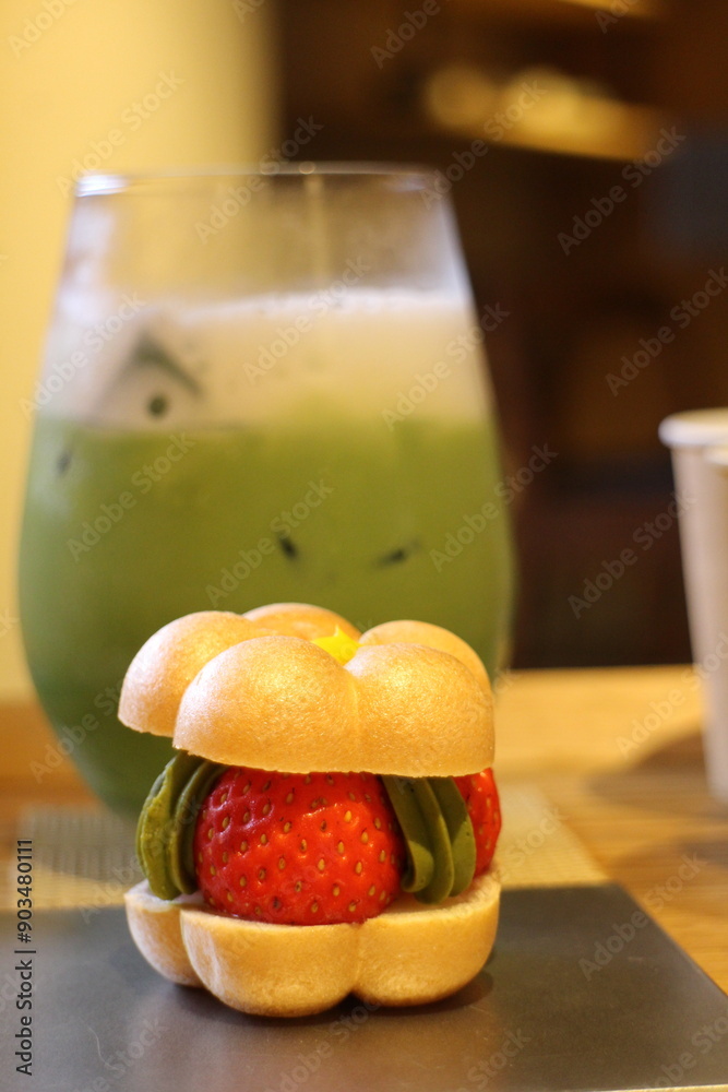 Iced Matcha tea latte and Monaka (Japanese sweets) in Kyoto, Japan Iced Matcha tea latte and Monaka (Japanese sweets) in Kyoto, Japan
