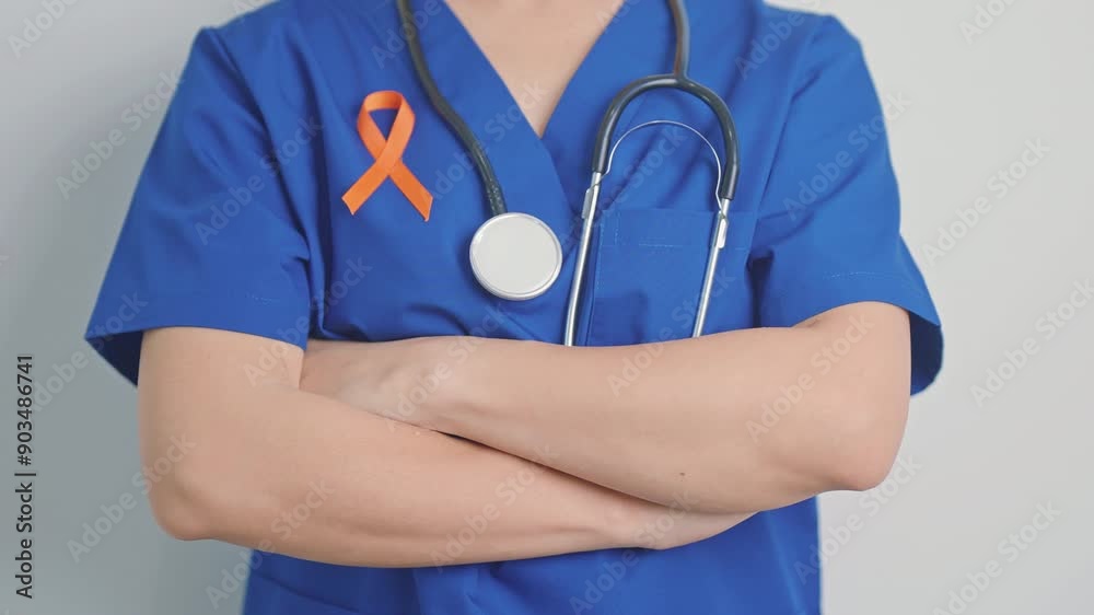 Orange Ribbon for Leukemia, Kidney cancer day, world Multiple Sclerosis, CRPS, Self Injury Awareness month. Healthcare and word cancer day concept Orange Ribbon for Leukemia, Kidney cancer day, world Multiple Sclerosis, CRPS, Self Injury Awareness month. Healthcare and word cancer day concept