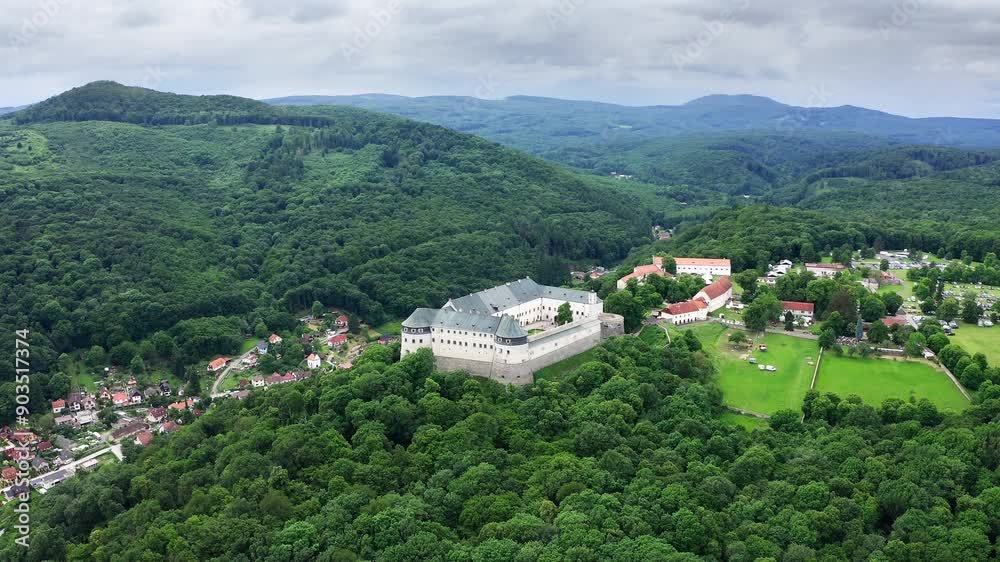 Cerveny Kamen Castle or Hrad is a 13th-century castle in southwestern Slovakia in Little Carpathians near the village of Casta. Aerial 4K footage shots. Cerveny Kamen Castle or Hrad is a 13th-century castle in southwestern Slovakia in Little Carpathians near the village of Casta. Aerial 4K footage shots.