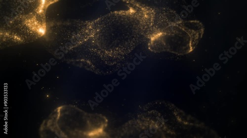Beautiful golden particles flying, shining, and glittering like magical shimmering light on a black background